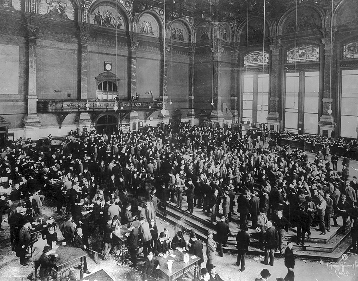 Interior of Board of Trade, the pit; Chicago, IL. Source: ICHi-18146. Chicago History Museum. Reproduction of photograph, photographer unknown. Date: 1896.